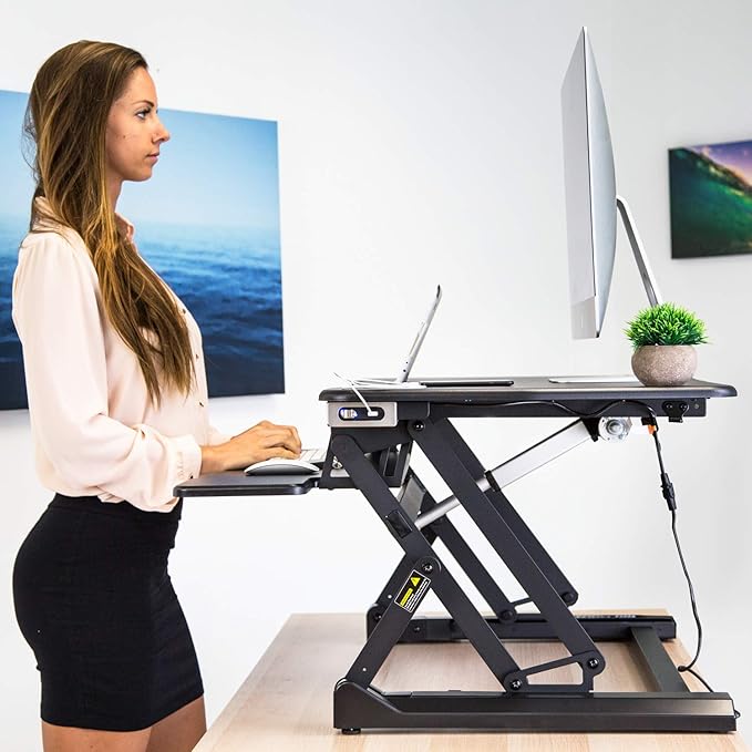 Mount-It! Electric Standing Desk Converter 35.4" x 23" Stand Up Desk Riser, Computer Workstations Motorized Desk Convertor, Sit to Stand with Built-in USB Port, Ergonomic Height Adjustable in Black