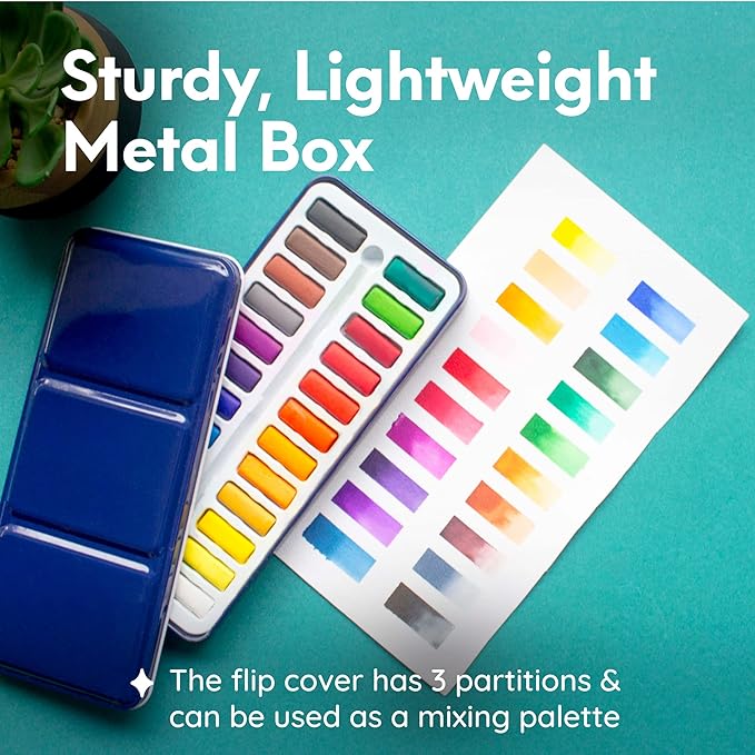 MozArt Supplies Watercolor Paint Essentials Set - Lightweight and Portable Metal Box - Lid Has 3 Partitions for Color Mixing - Easy-to-Blend Non-Toxic Formulation - 24 Vibrant Colors with Paintbrush